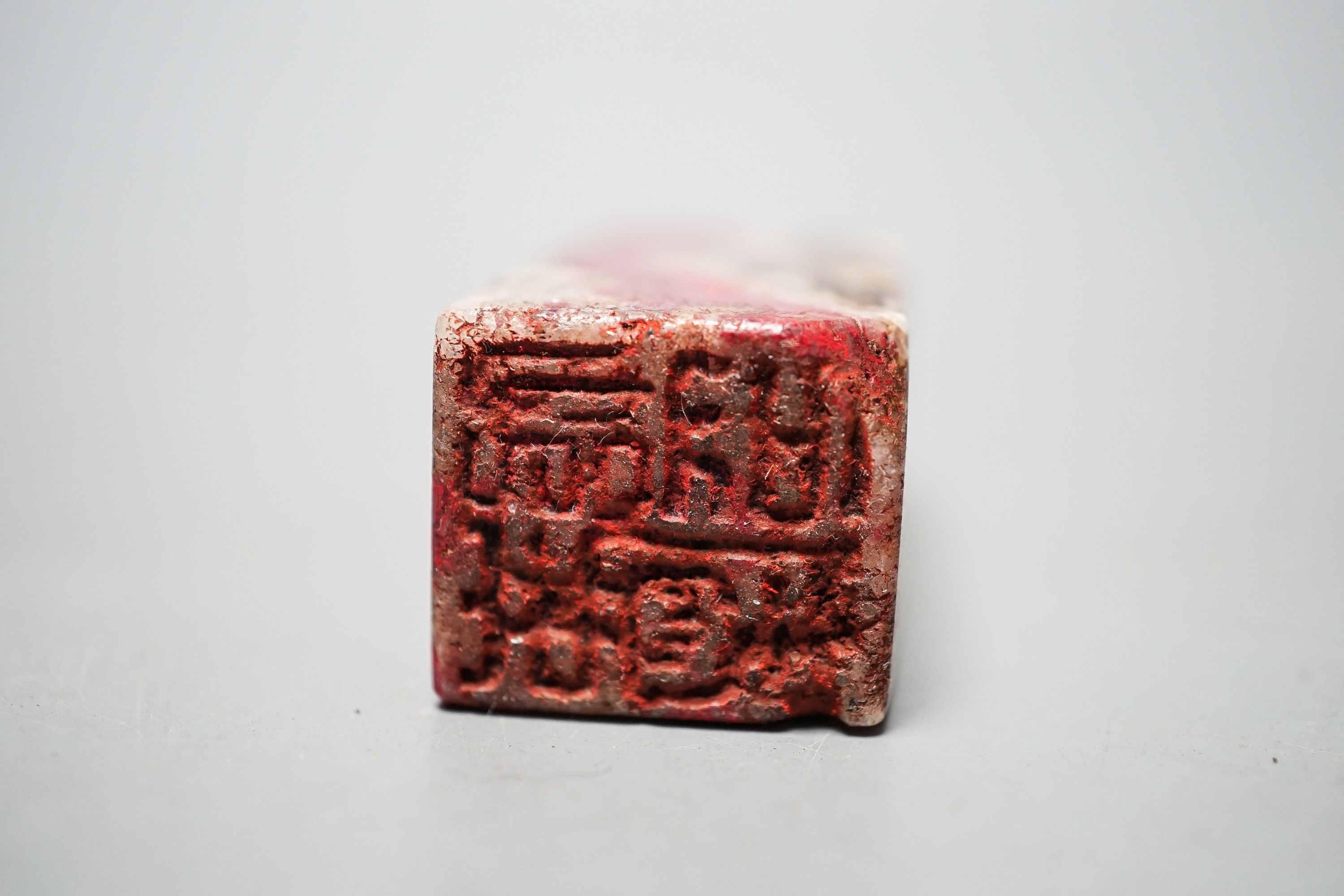 A Chinese chicken's blood soapstone seal, early 20th century 5.5cm